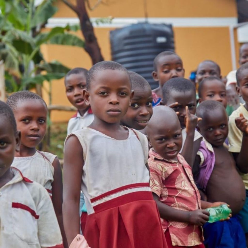 Children supported by the Foundation smiling together