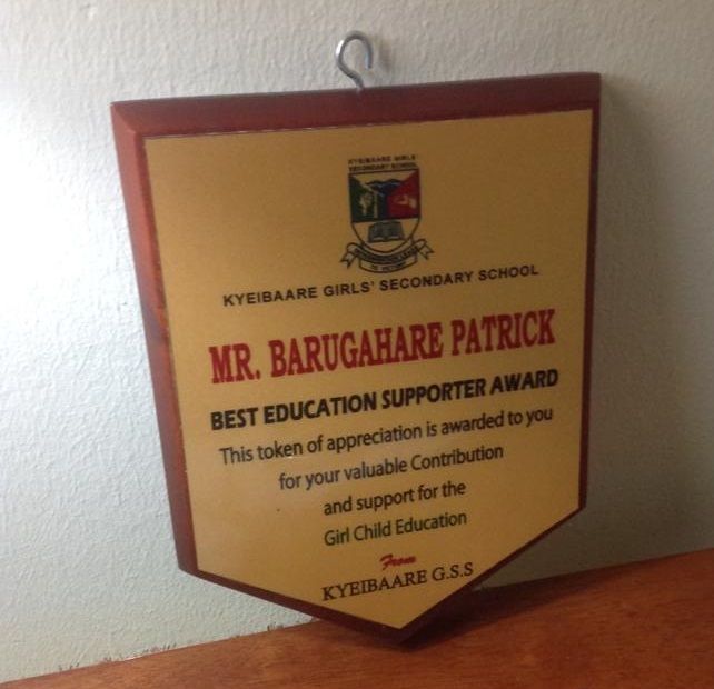 Patrick Barugahare receiving an award